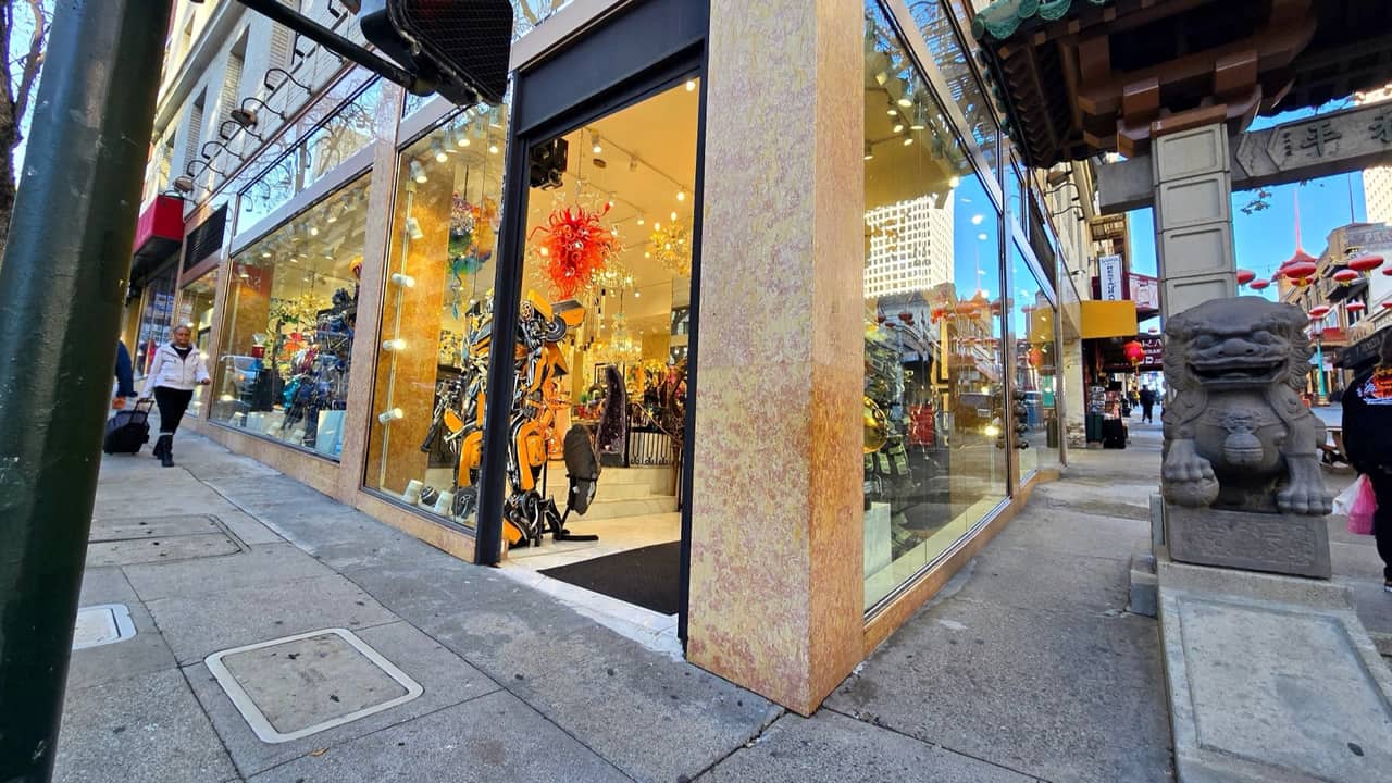Corner glass storefront with butt-glazed display windows, San Francisco Chinatown retail